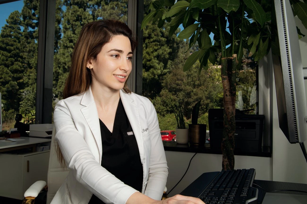Dr. Mersedeh Rajinia working under magnification