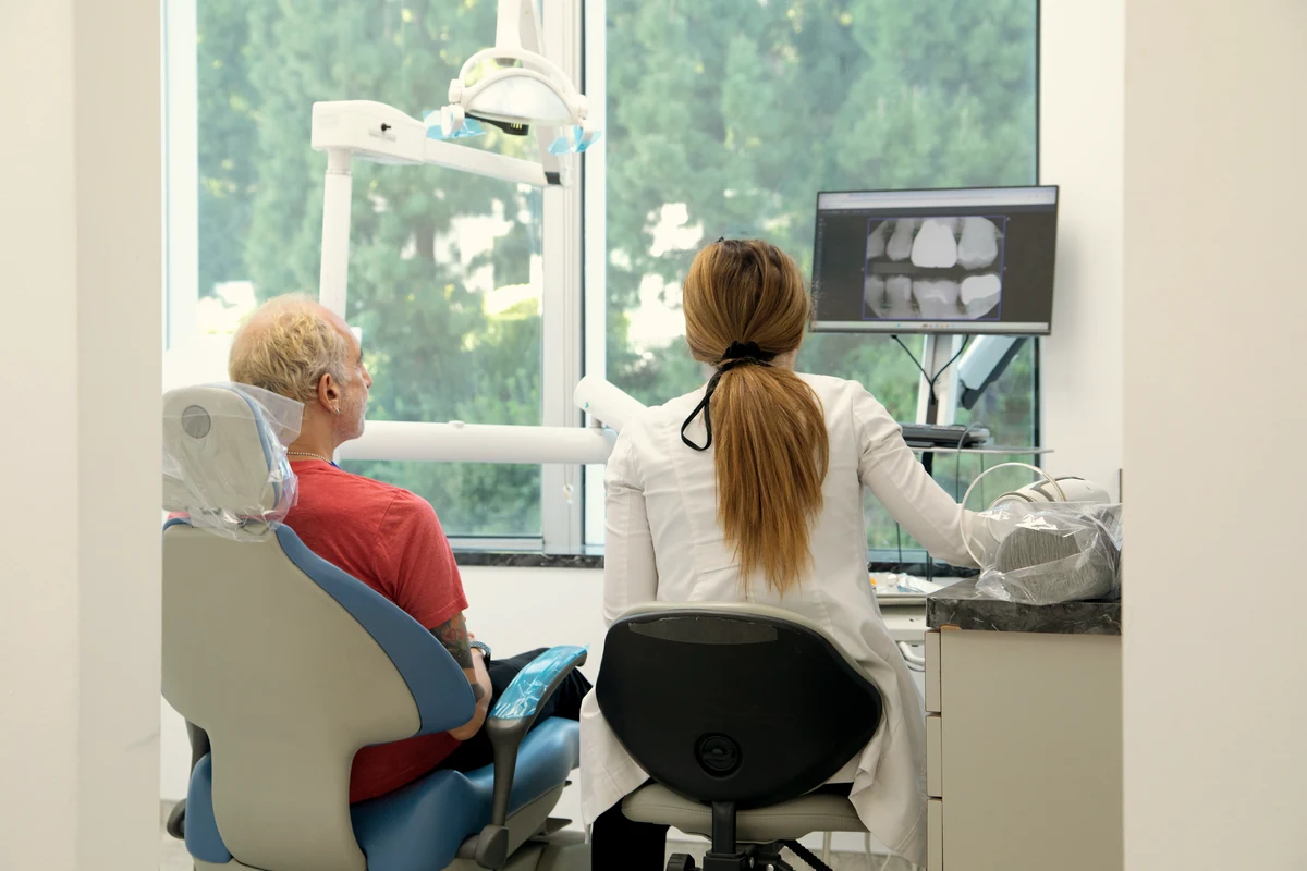 Dr. Mersedeh explaining findings to a patient